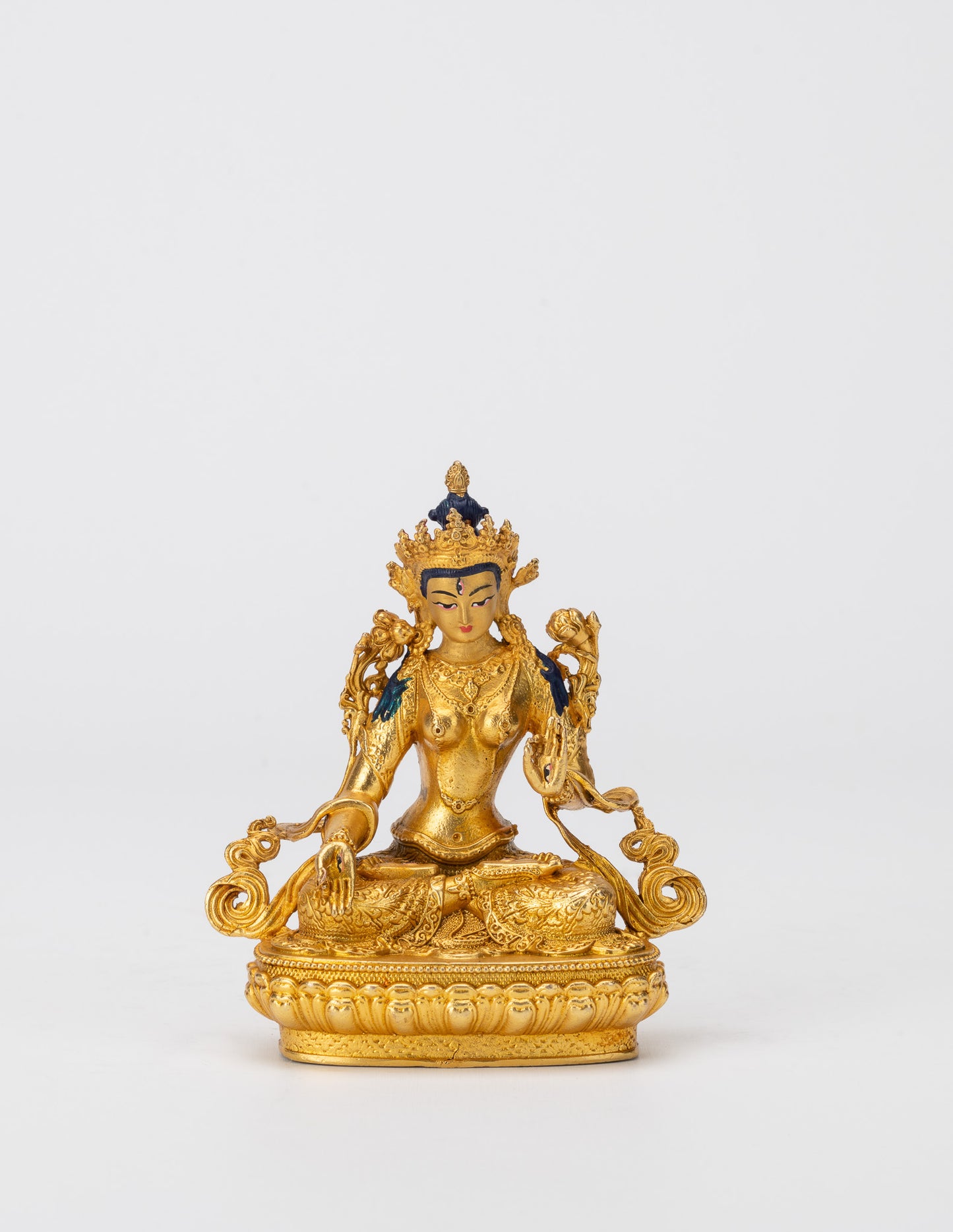 Kleine goldene Gottheitsstatuen