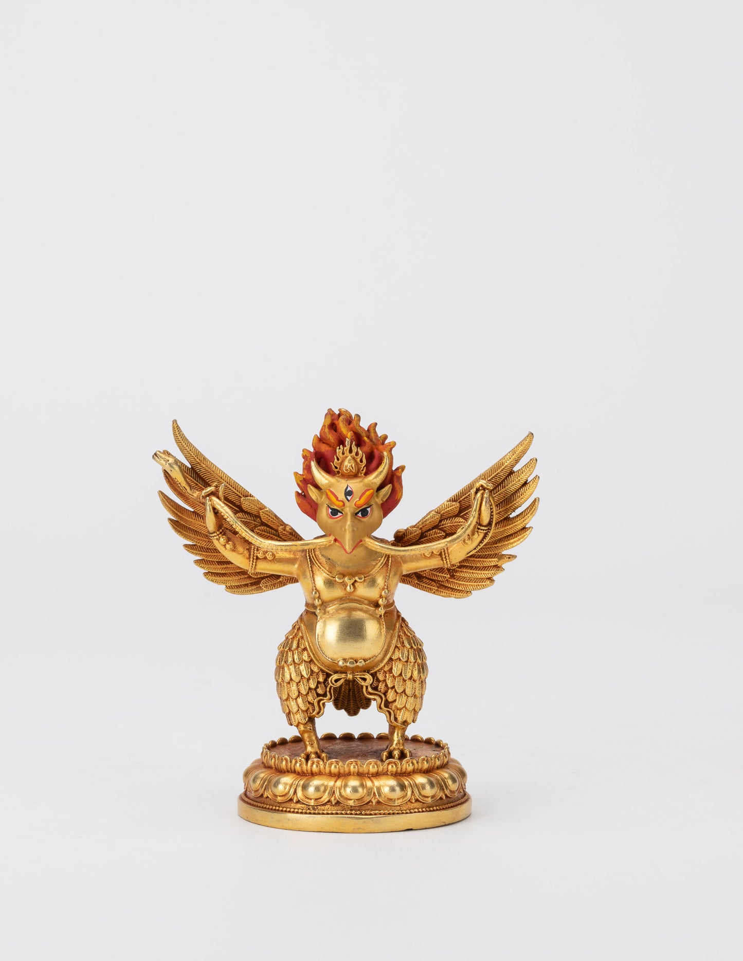 Kleine goldene Gottheitsstatuen